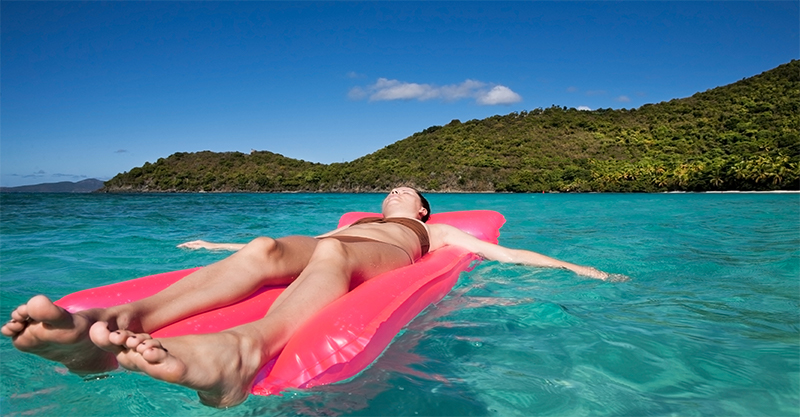 Caribbean-girl-on-floating-mat